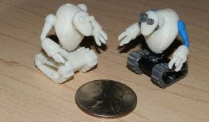 Huxter's Tread-Bots, placed next to a quarter for scale.